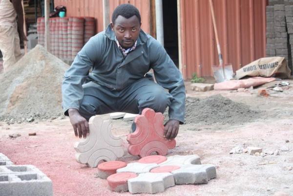 Tuyisenge Emmanuel,the proprietor of TEMACO Builders Ltd who discussed with IPRC students in Musanze district on a variety of business and technical issues.