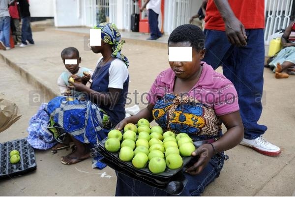 Women selling apples in Kigali