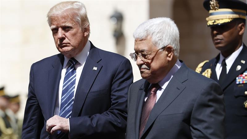Trump is welcomed by Palestinian leader Mahmoud Abbas at the presidential palace in Bethlehem
