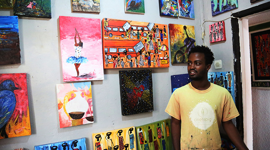 Emmanuel Mutuyimana talks about the art pieces at Ivuka Arts Gallery in Kigali.