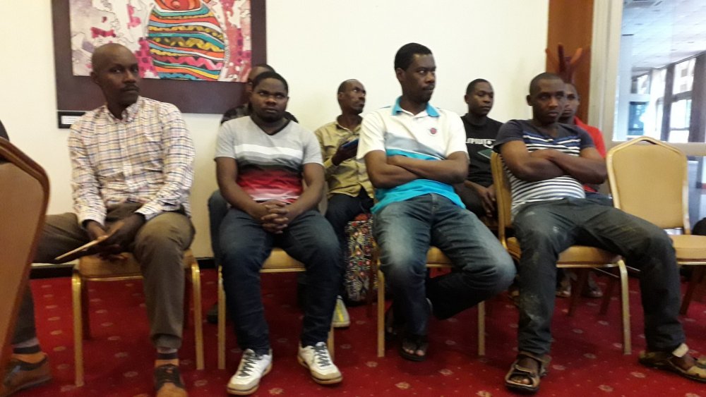 The 9 Rwandans were handed over to Rwanda's High Commissioner to Uganda Frank Mugambage this morning