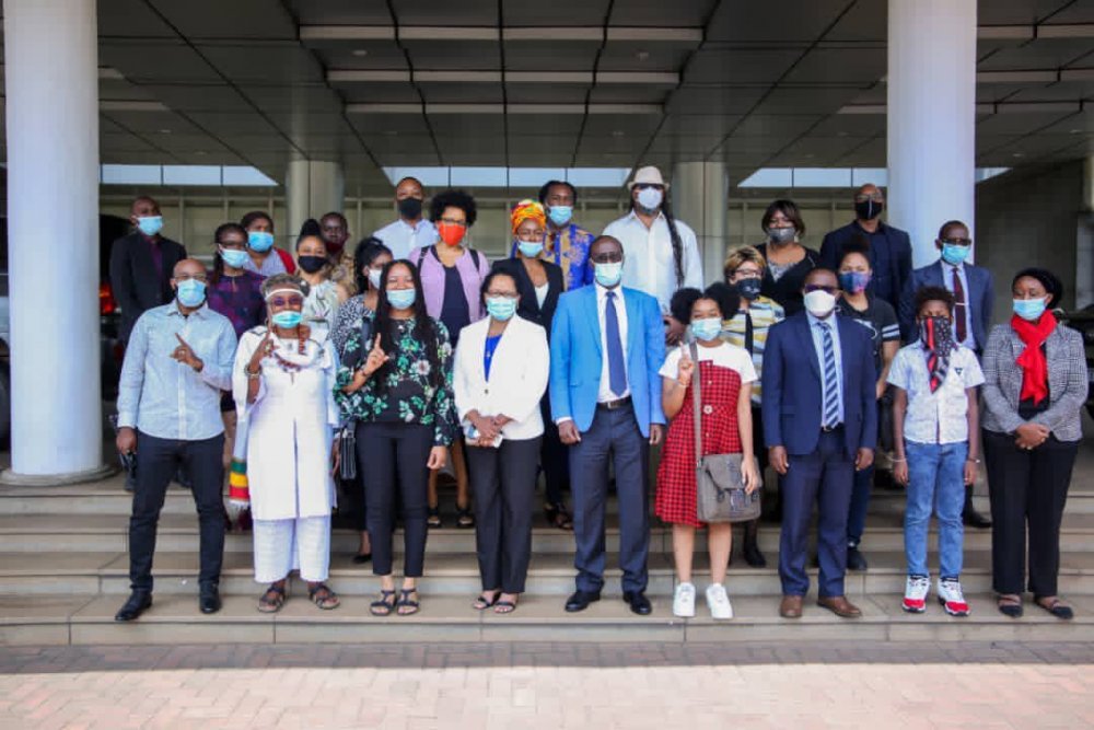 Prof. Nshuti Manasseh in a group photo with 16 returnees of African descent from the USA and other parts of the world who are working to settle and make Rwanda their home. 