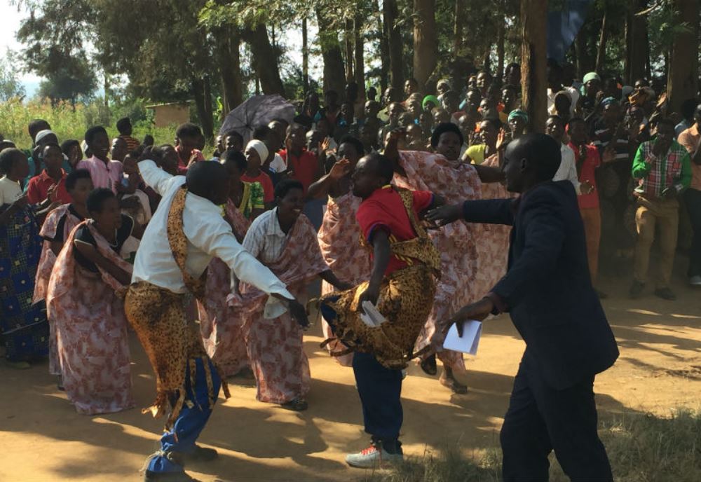 Excited residents welcome Tigo staff with songs and dance