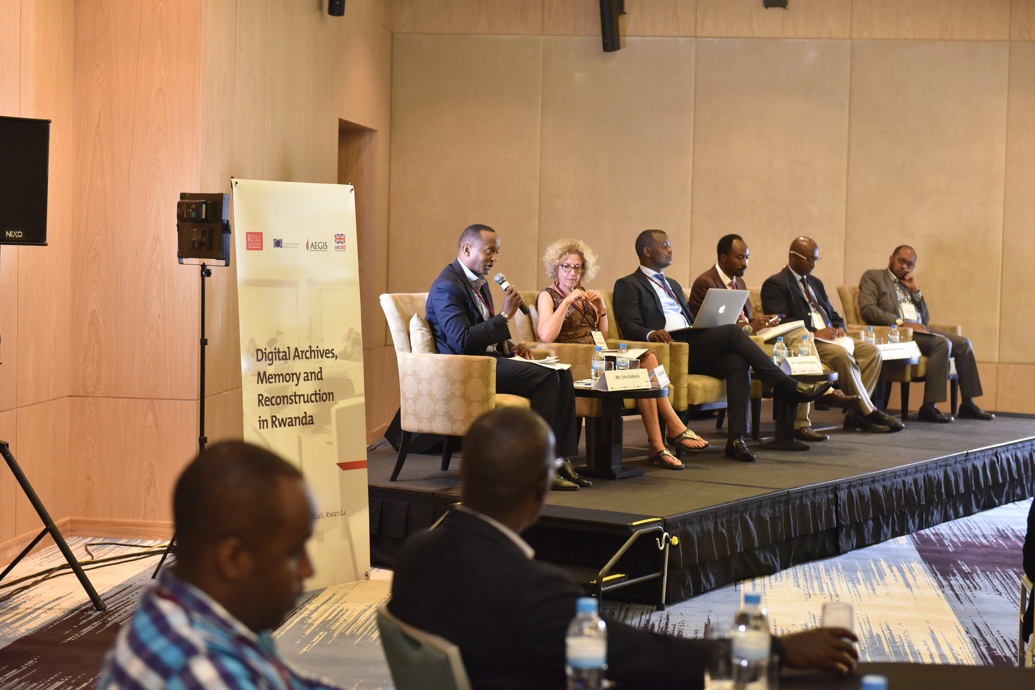 Experts on panel discussing Digital Archives, Memory and Reconstruction in Rwanda.