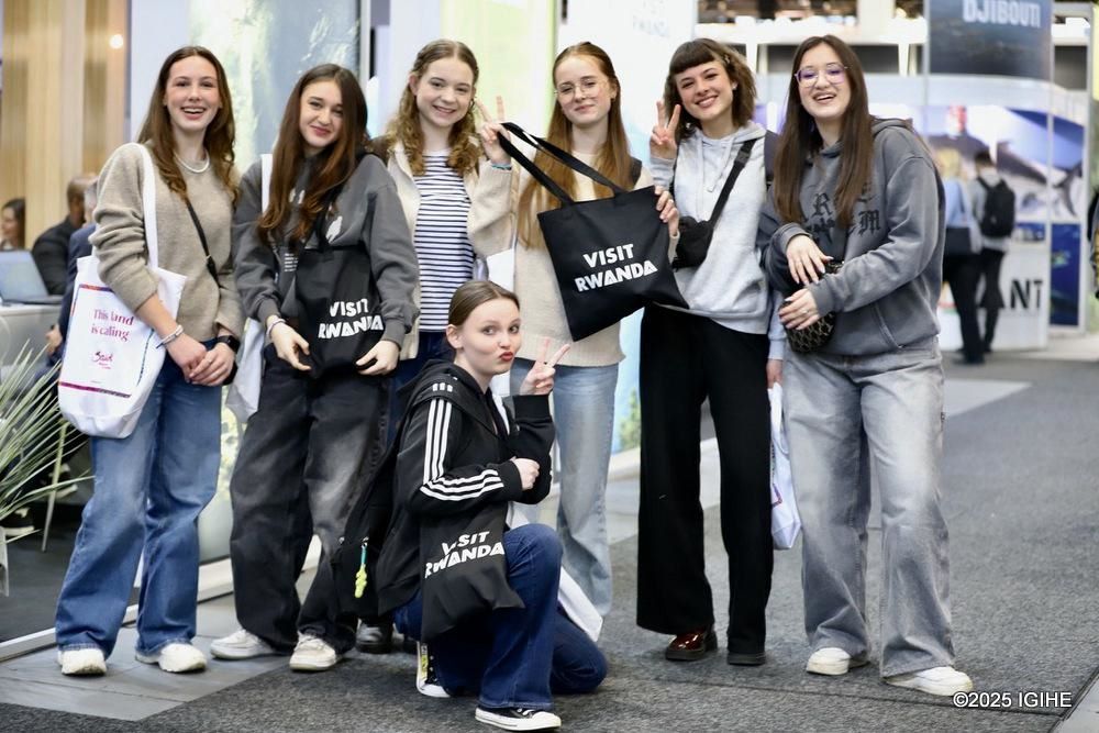 This photo shows young German visitors at the Visit Rwanda stand, eager to learn more about traveling to the Land of a Thousand Hills.