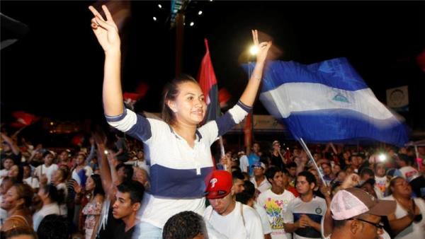Supporters of Nicaragua's President Daniel Ortega flock to the streets of the capital to celebrate