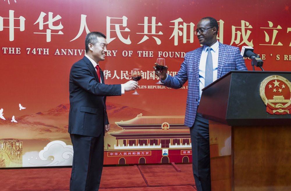 Prof. Nshuti joining Chinese Ambassador, Wang for a toast at the celebration.
