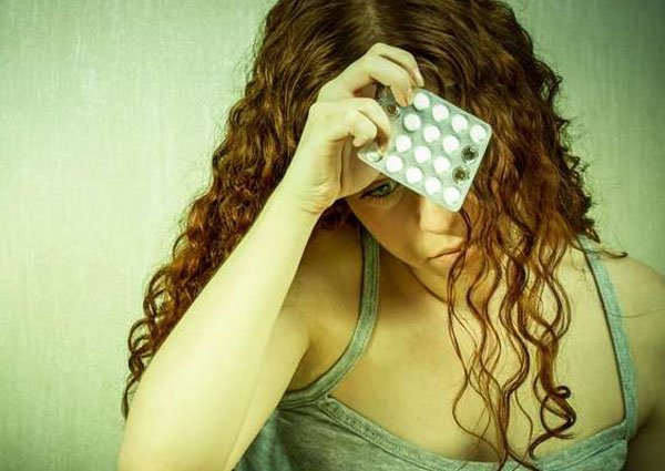 A teenager holding contraceptives after taking recommended dose. In Kwale County, young girls are already using contraceptives.