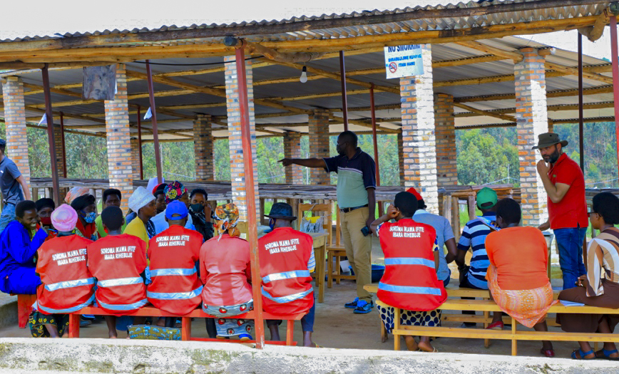 Farmers following presentations during the training.  