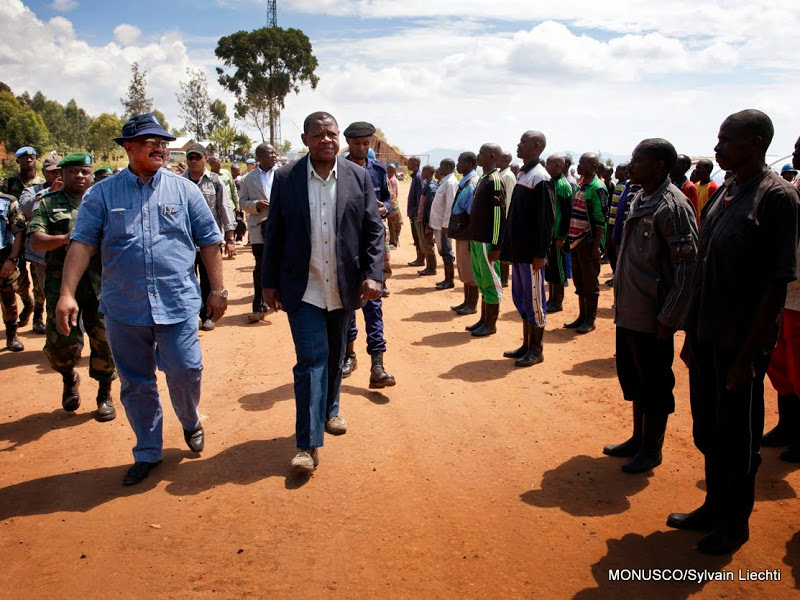 MONUSCO DSRSG, Abdallah Wafy and Lambert Mende, DRC minister of communication arrived in Kanyabayonga MONUSCO base where FDLR rebels who surrendered to SADEC are accommodated with the logistic support of MONUSCO , the 5th of June 2014. © MONUSCO/Sylvain Liechti