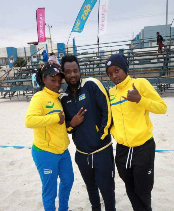 Late Theobald Niyongira (in the middle)