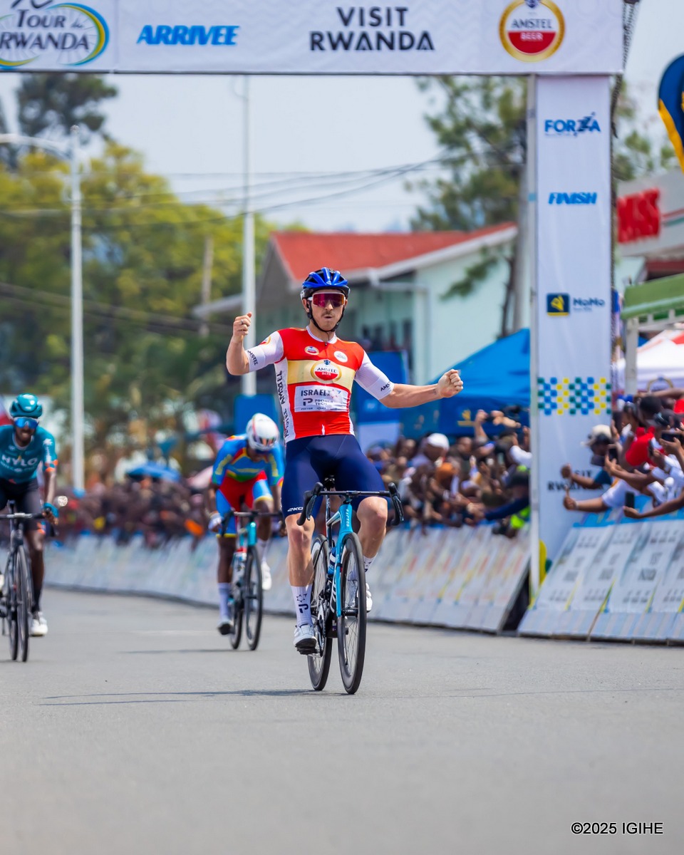 Australian cyclist Brady Gilmore celebrating his victory as he crossed the finish in Rubavu.