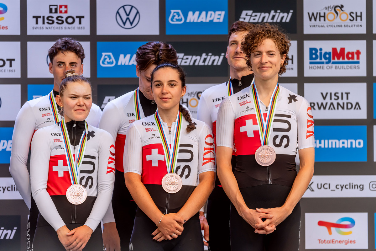 Switzerland, also battling hard throughout the race, secured third place with a time of 54:58.89.