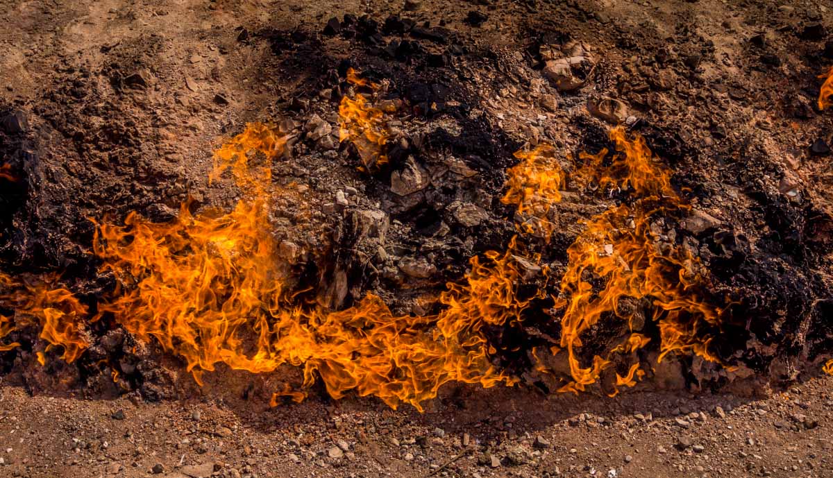 Yanar Dagh is a hillside that has flames burning naturally, fed by gas seeps underground.