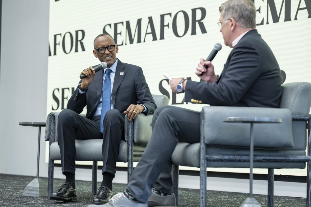 The conversation with President Paul Kagame (left) was moderated by Semafor editor, Steve Clemons (right). 