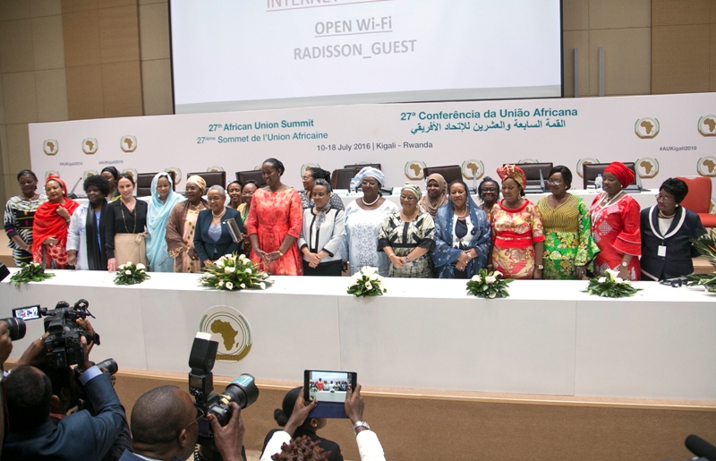 African first ladies pose for a group photo yesterday