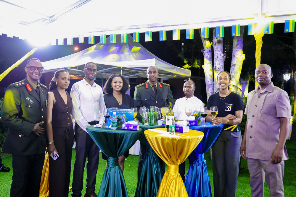 Friends and compatriots reconnect with laughter and warm embraces during the celebration.