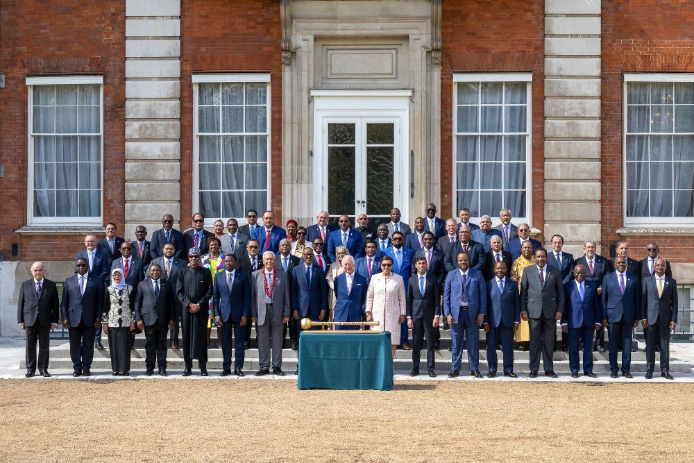 Participants posing for a group photo after attending the Commonwealth Leaders Meeting.