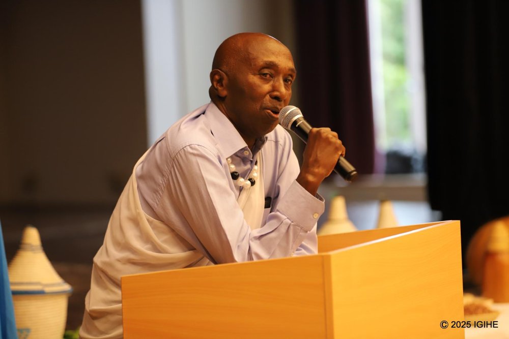 Oscar Gahutu delivered a special presentation on the historical significance of Umuganura in pre-colonial Rwanda.