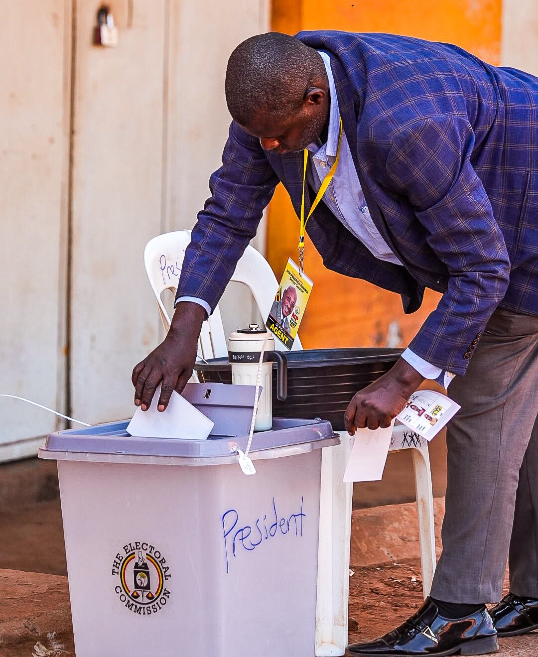 A man casts his vote at a polling station in Kampala, Uganda.
