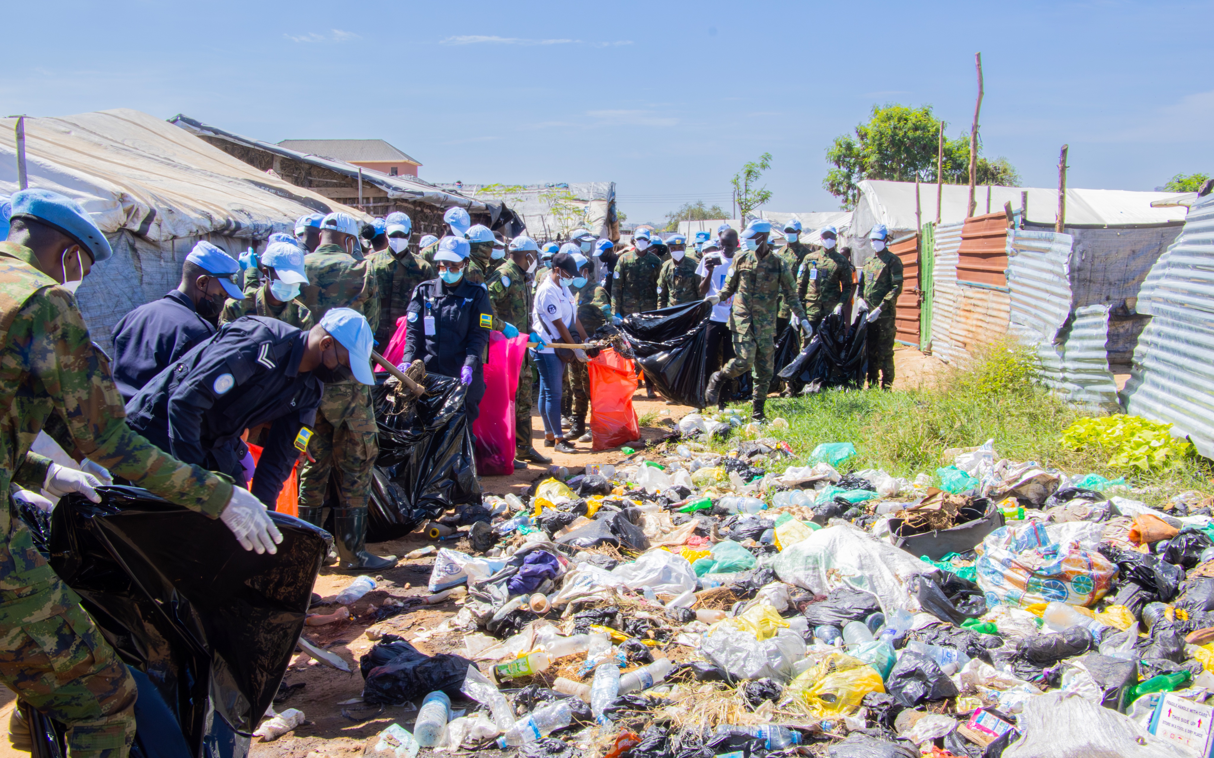 During the outreach, participants engaged in clearing overgrown vegetation, eliminating mosquito breeding sites, educating residents on malaria prevention methods, and distributing mosquito repellents to families living in the camp.