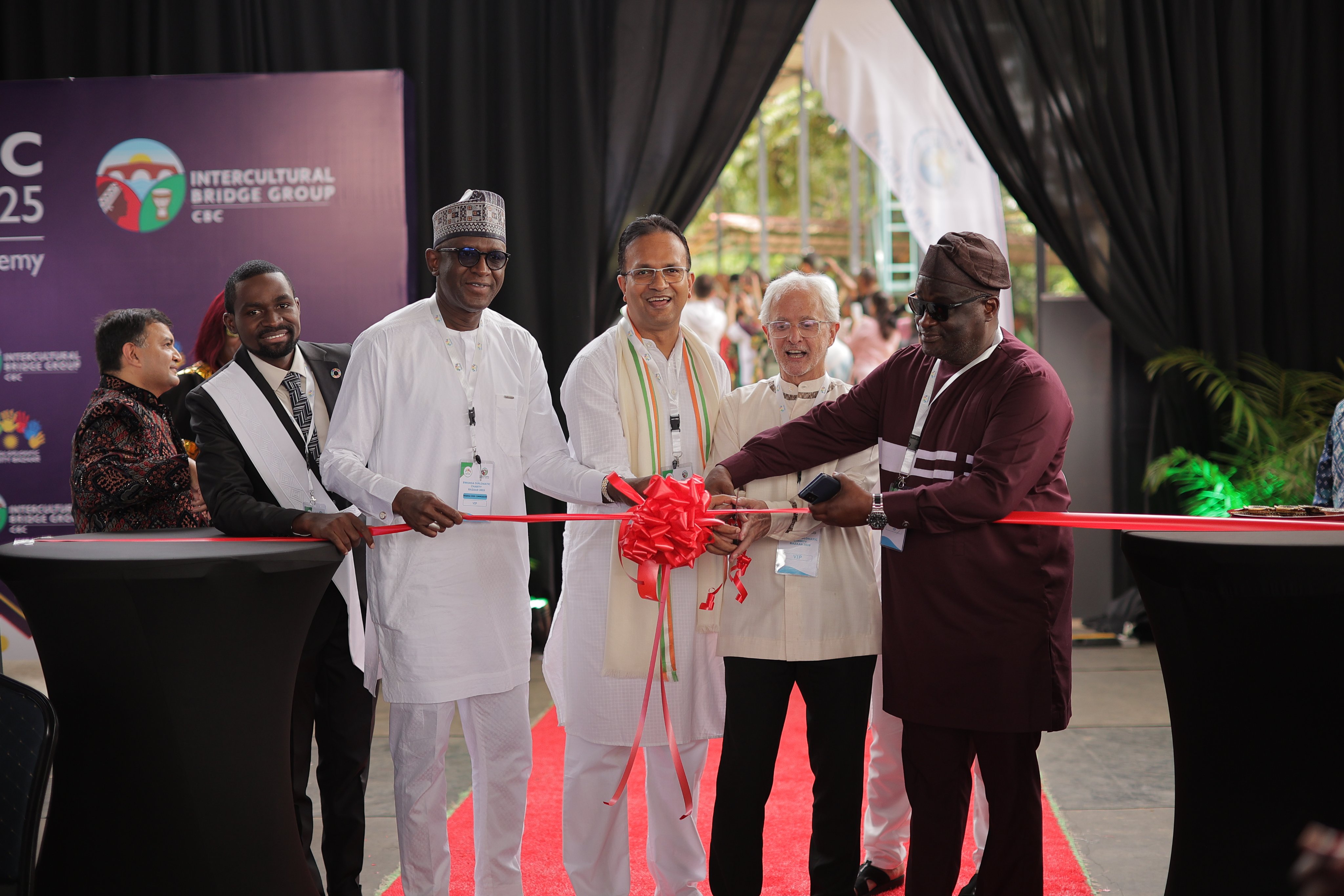 Indian High Commissioner to Rwanda, Mridu Pawan Das (centre), and other envoys cut a ribbon to officially kick off the first edition of the Diplomatic Charity Bazaar at Green Hills Academy on Saturday, November 22, 2025.
