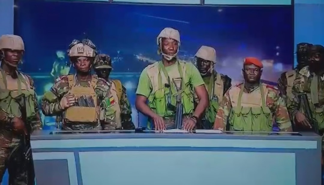 Gunshots were reported at Camp Guezo, near the president's residence in the largest city of Cotonou, and local media said soldiers had taken control of the state broadcaster.