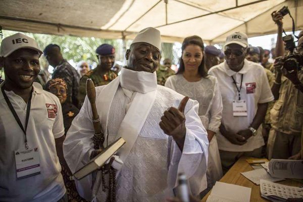 Yahya Jammeh (centre) gestures before casting his vote at a polling station in the presidential election in Banjul, Gambia, on December 1, 2016. He seized power in a 1994 coup and had until now survived multiple attempts to remove him from the presidency.
