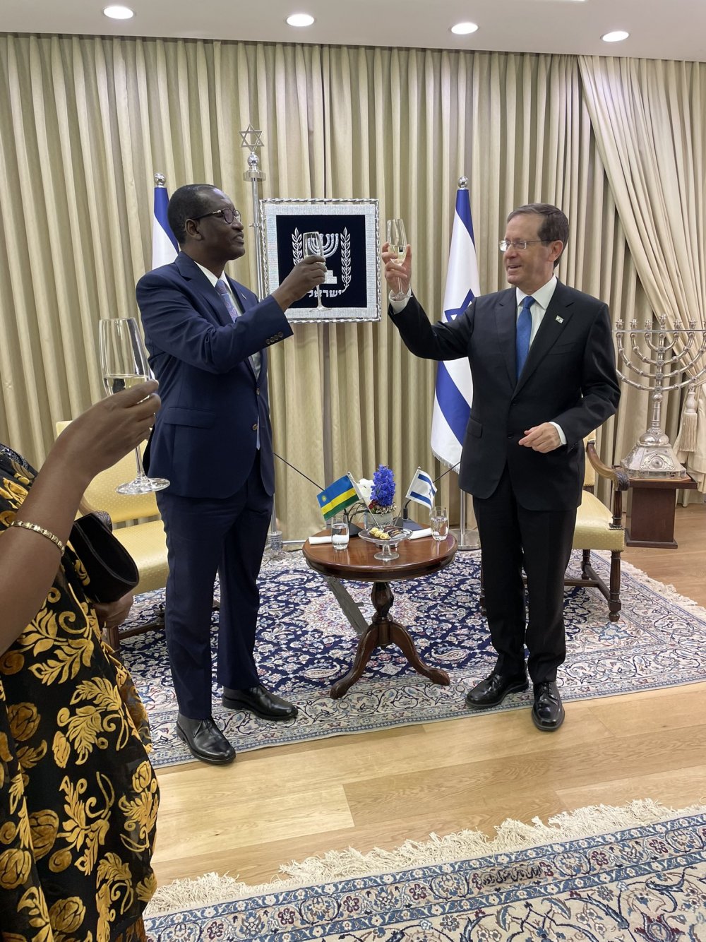 Amb. Gatera joining President Isaac Herzog for a toast.  