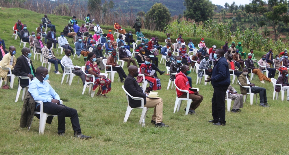 The Minister of Local Government, Jean Marie Vianney Gatabazi speaking to Nyaruguru residents.