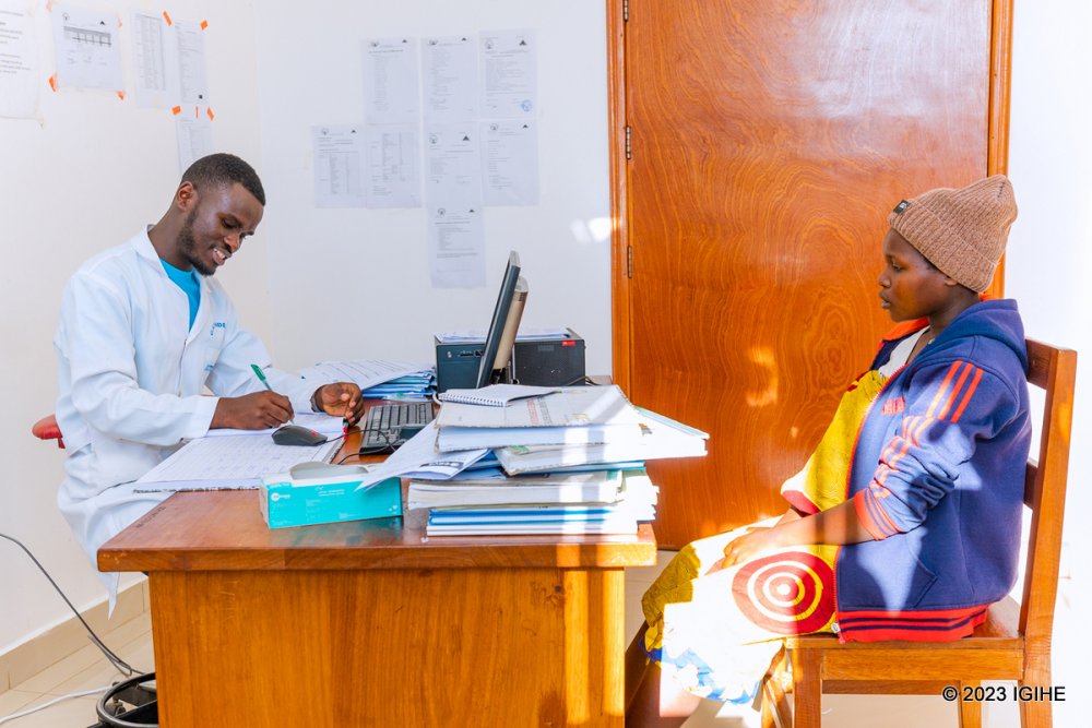 A healthcare practitioner attending to a patient at Gatonde Hospital.