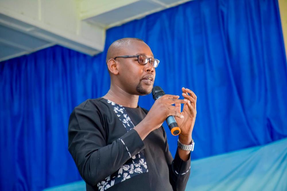 Gerard Murasira, the Director Teacher Training Unit at REB speaking at the opening ceremony. 