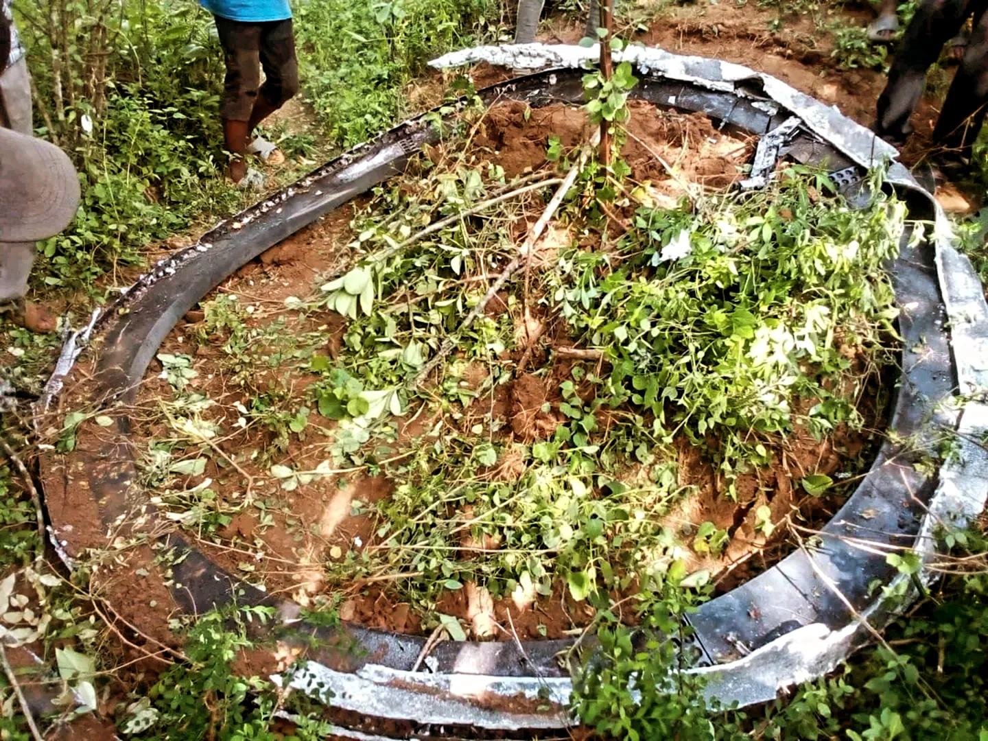 The metallic object, measuring approximately 2.5 meters in diameter, startled residents when it fell in the village, creating a loud thud upon impact.