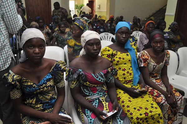 Some of the recently freed girls from Chibok wait in Abuja on May 7, 2017.