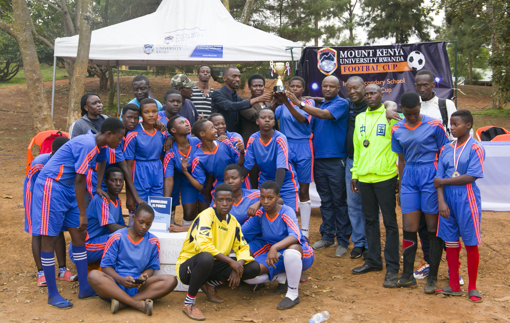 Mayor Dr. Jeanne flanked by Dr. John with other MKUR staff share group photo with the winning teams