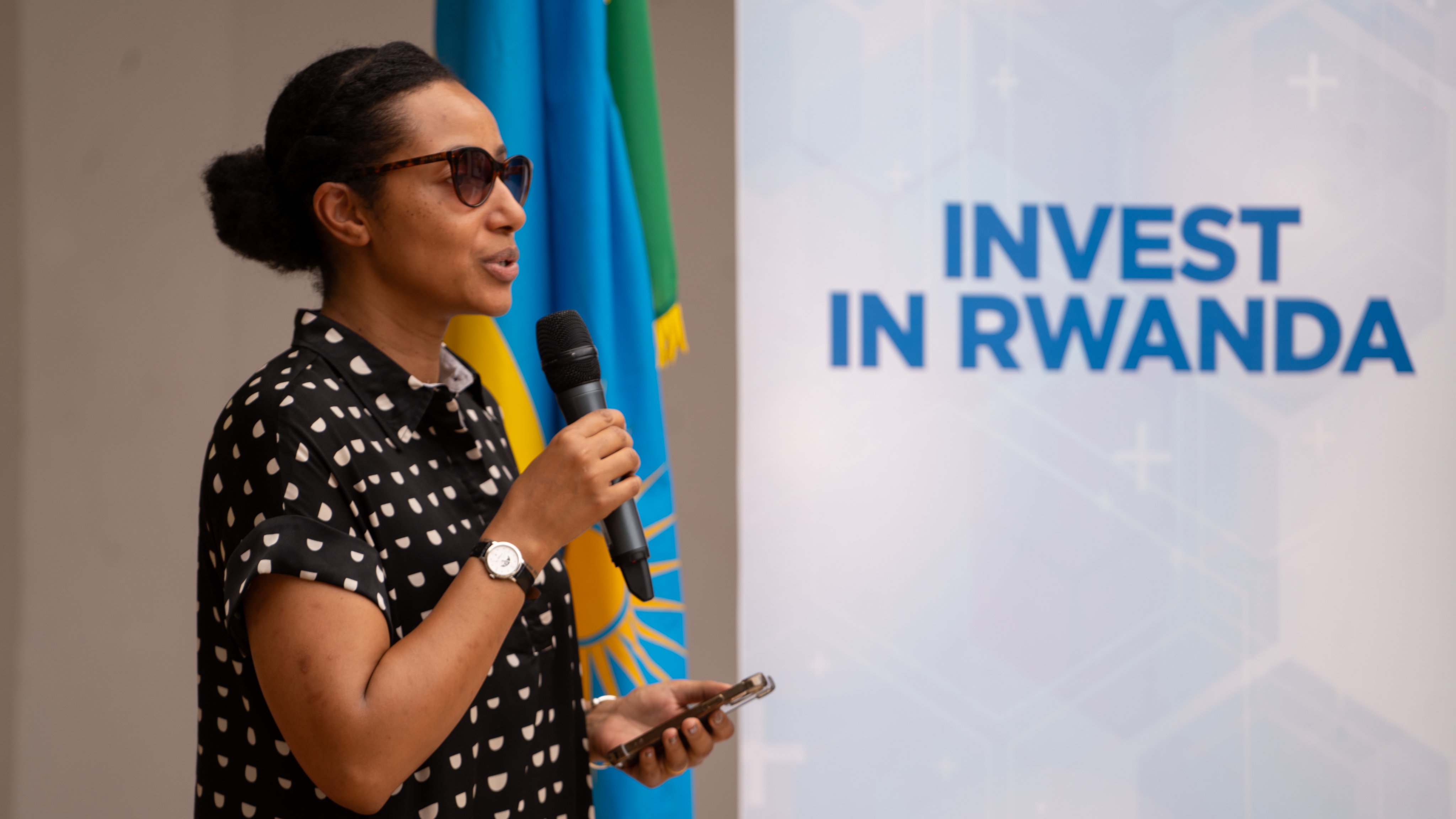 Rwanda Convention Bureau Deputy CEO, Candy Basomingera, delivers her speech during the investors meeting in Dakar