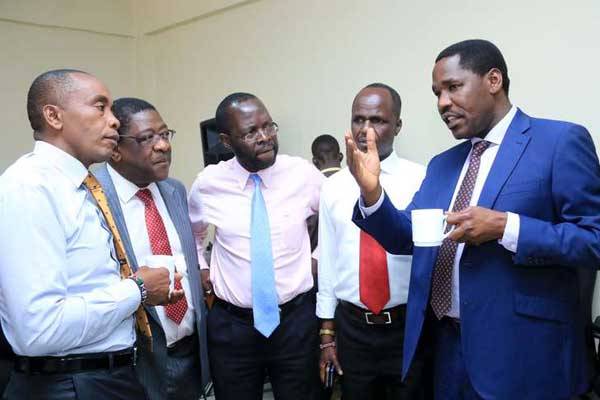 Meru Governor Peter Munya (right) speaks with Senate PAIC members Kimani Wamatangi, Amos Wako, Anyang’ Nyong’o and Kennedy Mong’are. Concerns are emerging that corruption has fast devolved into the counties as governors fail to attract and retain qualified personnel to professionally run the governments.