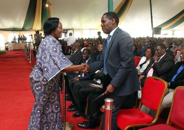 Council of Governors Chairman Peter Munya greets Narc Kenya leader Martha Karua during a funeral ceremony of the late Jackan Ndathi, father to Kirinyaga governor Joseph Ndathi, at Kimunye area in Gichugu on June 8, 2016.