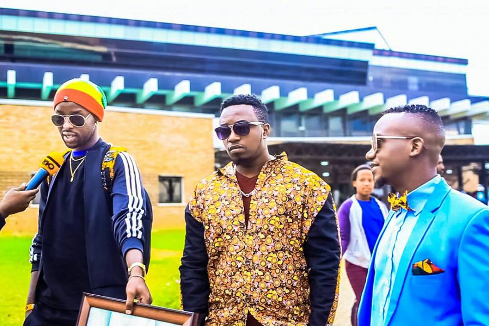 Ugandan music star, Eddy Kenzo (middle) set to shoot a video with Rwandan music icon Mani Martin