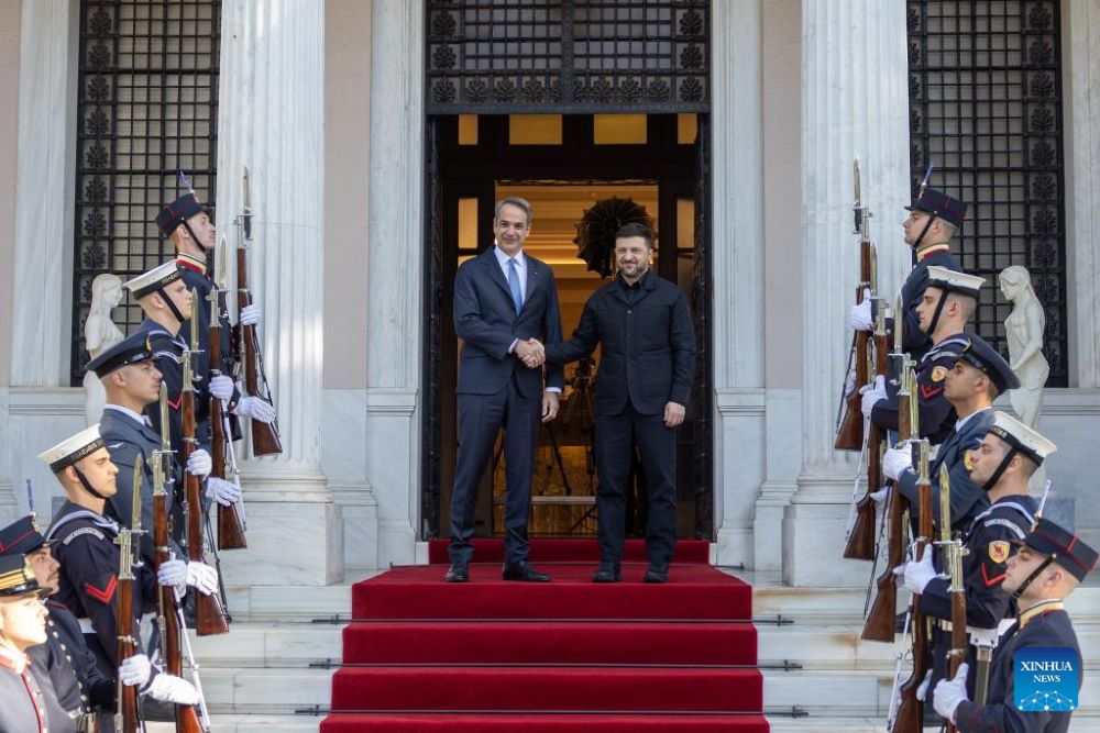 Greek Prime Minister Kyriakos Mitsotakis (L, C) shakes hands with Ukrainian President Volodymyr Zelensky (R, C) at Maximos Mansion, in Athens, Greece, on Nov. 16, 2025. Ukrainian President Volodymyr Zelensky paid a brief visit to Greece on Sunday, during which the two countries signed a natural gas agreement.