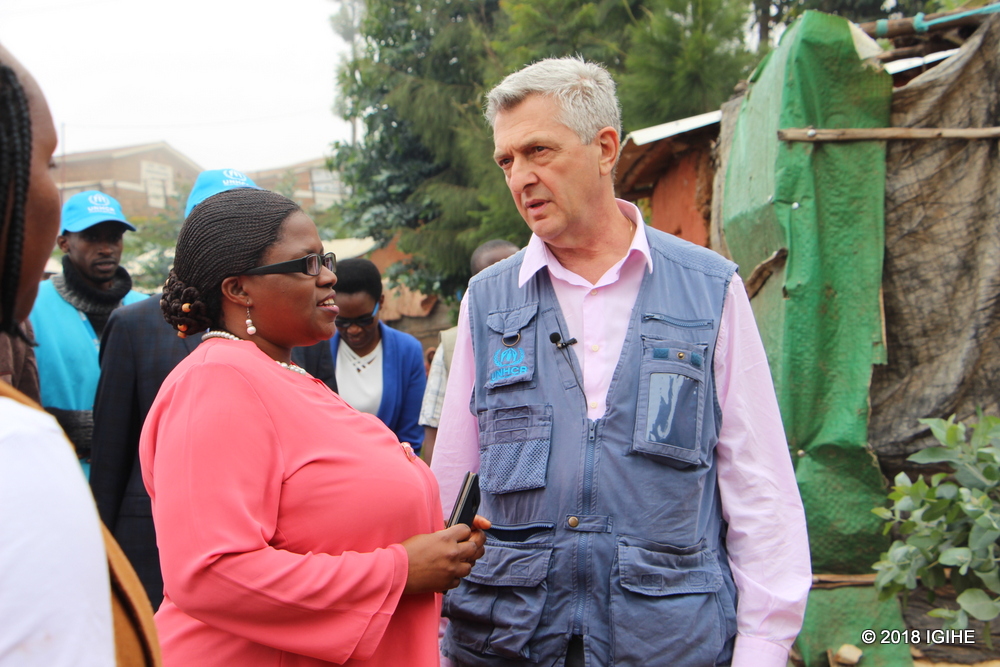 The United Nations High Commissioner  for Refugees (UNHCR) boss, Filippo Grandi chats with the Minister of  Disaster Management and Refugees and Refugee Affairs, Jeanne d'Arc Debonheur 