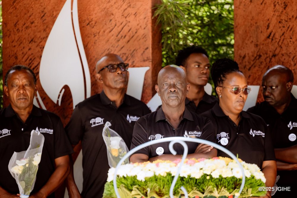 The President of Rwanda Tennis Federation, Karenzi Theoneste joine dthe group visiting Kigali Genocide Memorial.