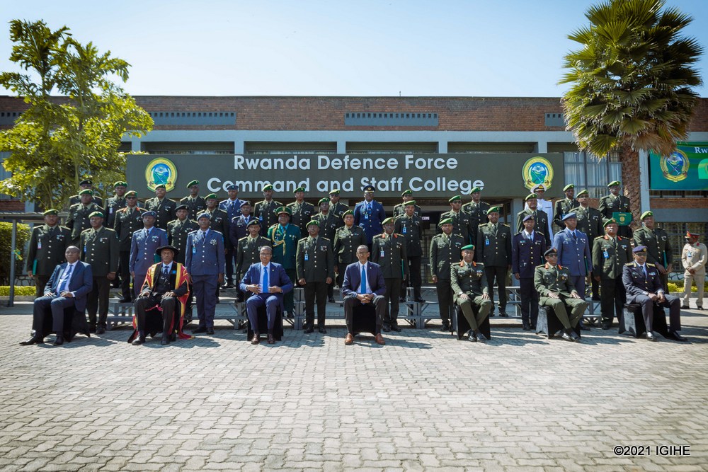 President Paul Kagame in a group photo with graduates.