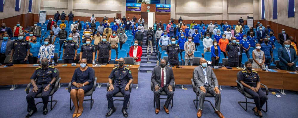 Trainees in a group photo with officials.  