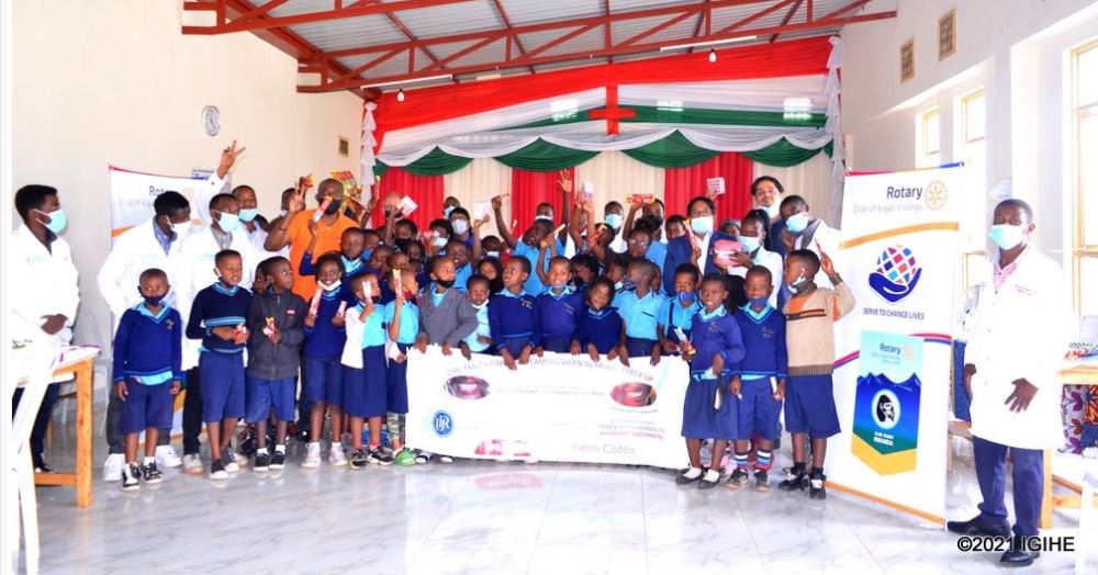 Learners with UR medical team and representatives from Rotary Club Kigali Virunga in a group photo after the dental check-up exercise. 