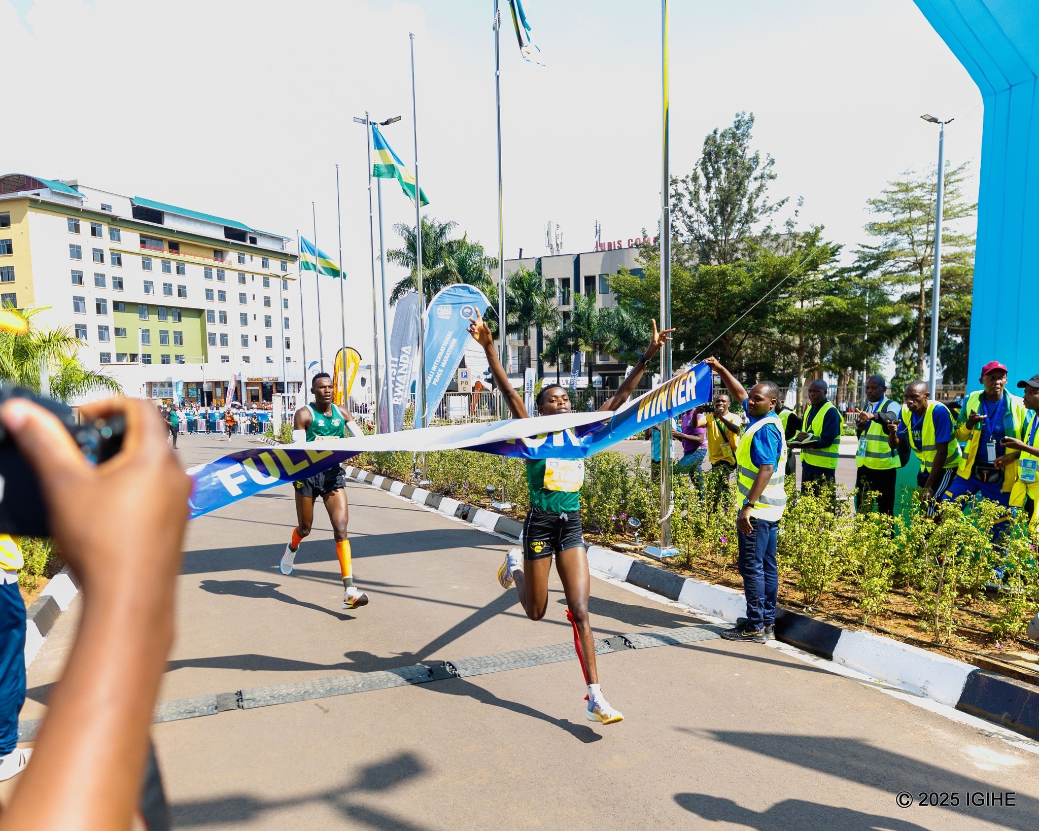 Florence Niyonkuru thrilled local fans by winning the women’s half marathon in 1:13:57, leading a commanding Rwandan performance that placed seven local runners in the top eight.