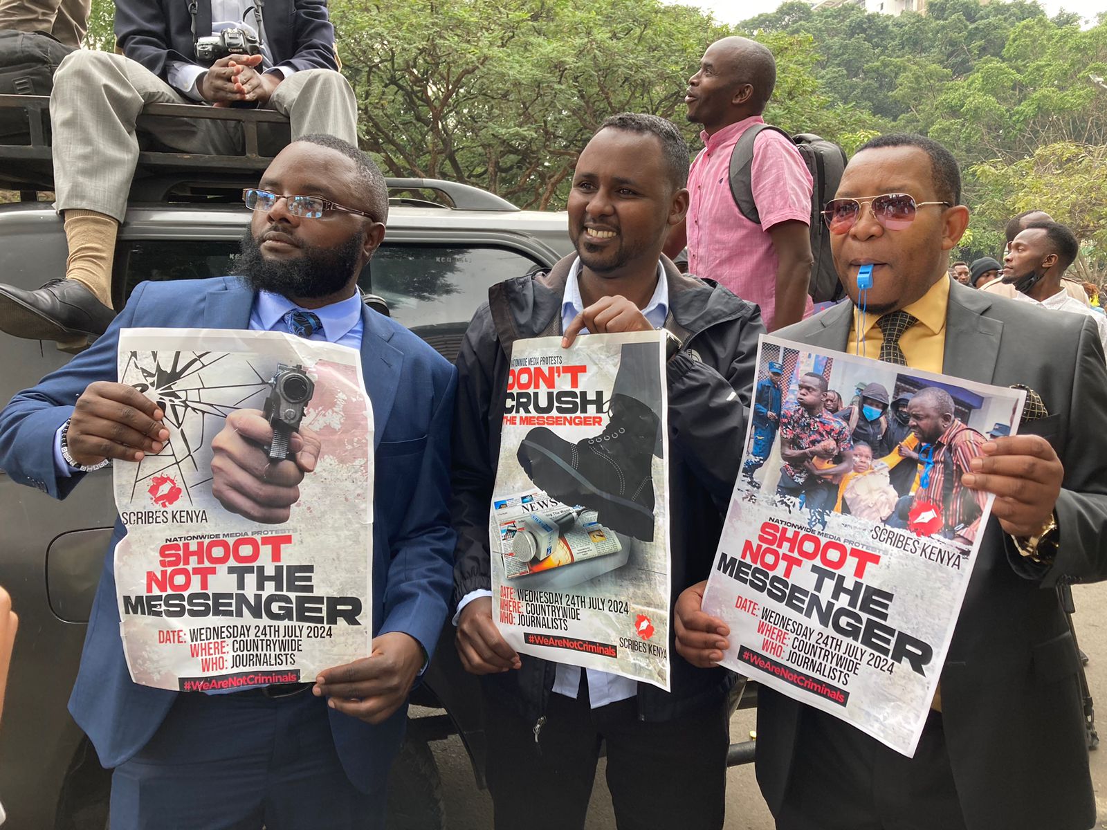 Through the Kenya Media Sector Working Group, journalists carrying placards with messages such as 'Shoot Not the Messenger' brought business to a standstill as they marched across Nairobi streets to deliver their petition to the police.