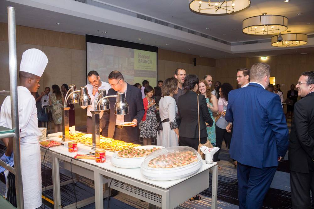 Guests sampling some of the Italian delicacies at the food station