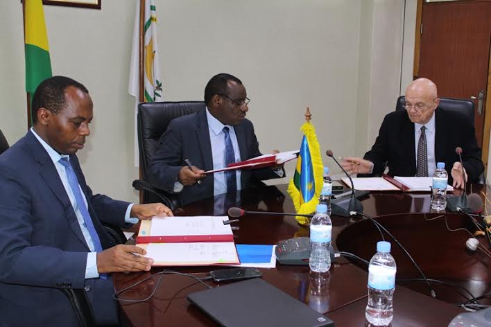 The CEO of RDB, Francis Gatare,The Minister OF Finance and Economic Planning , Ambassador Gatete Claver and Alex Lifschitz, the deputy director of Oshen Health Care Rwanda Ltd signing agreements yesterday.