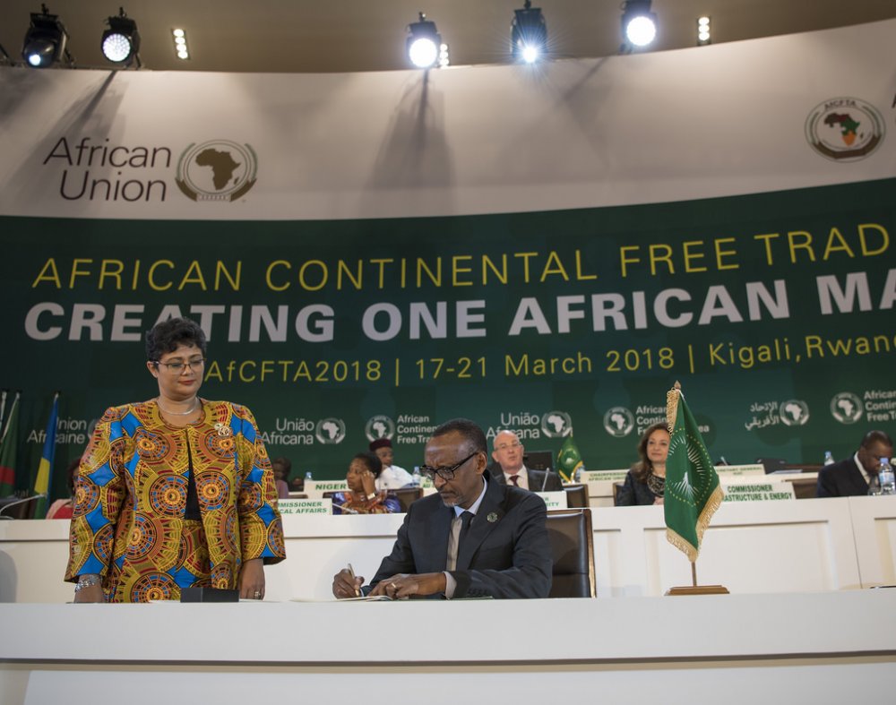 Chairperson of the African Union, President Kagame signing the African Continental Free Trade Area agreement